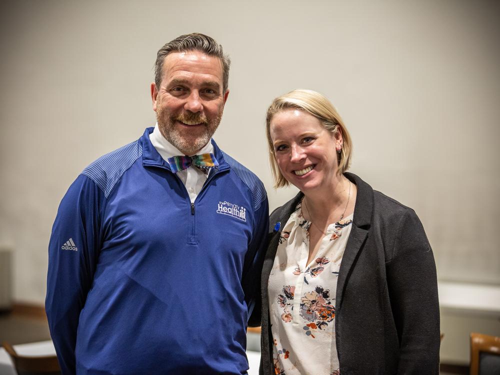 George Garrow and Jennifer Kraschnewski smile for a photo