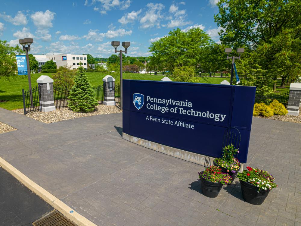 The sign on the Penn College campus, reading Pennsylvania College of Technology a Penn State affiliate