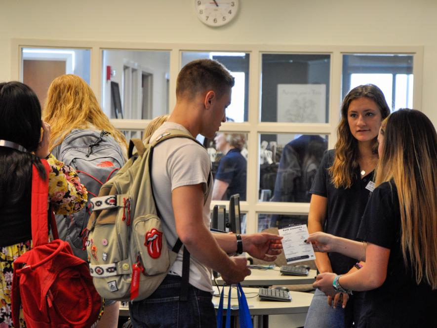 Students chat with each other during the Career Services open house event
