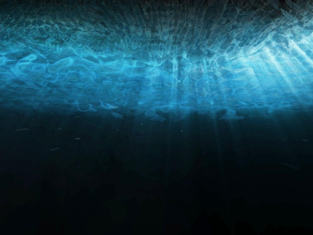 A stock image of waves under the water's surface.