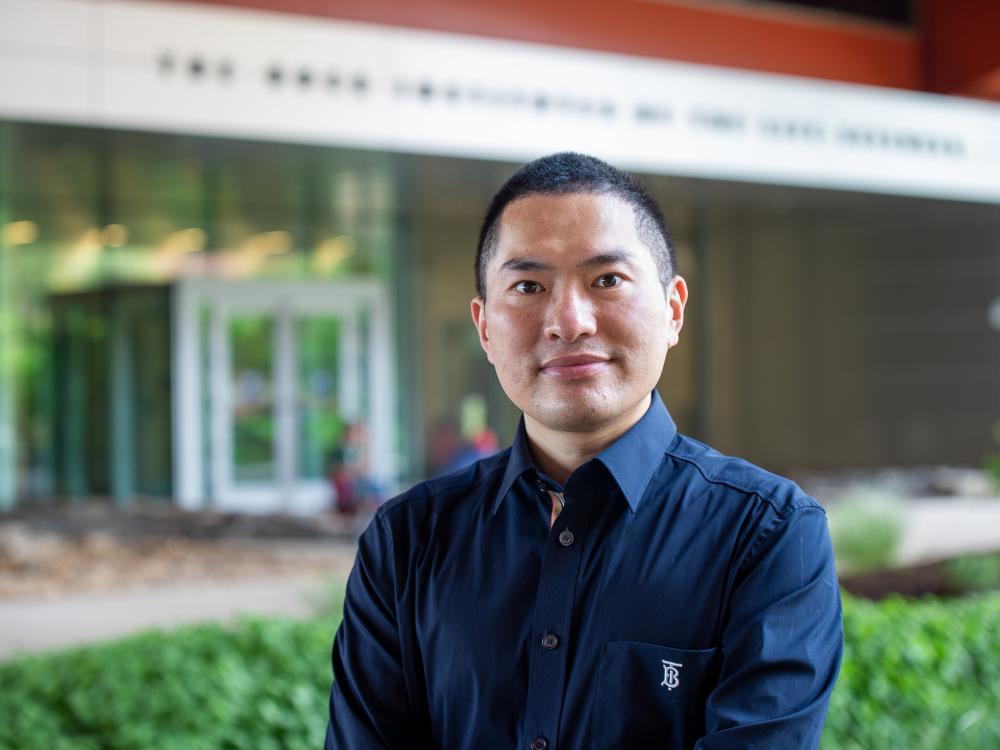 Lance Lian in the front of the Huck Institutes of the Life Sciences.