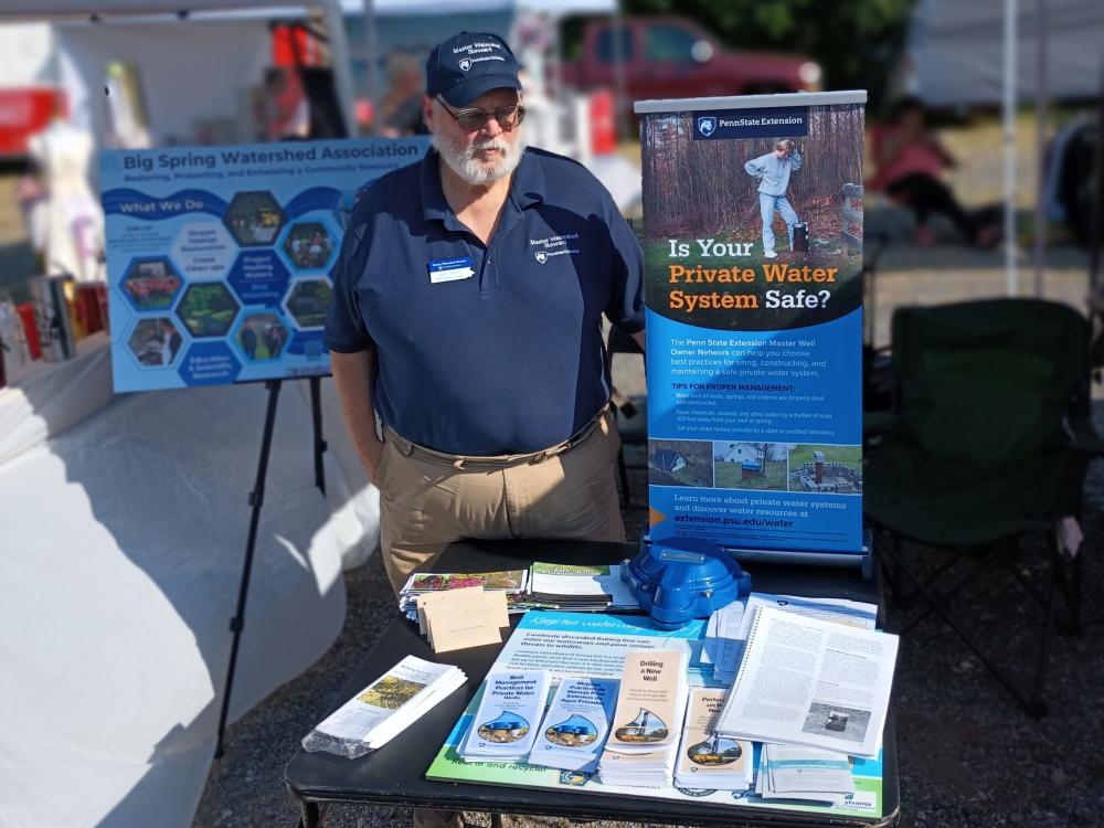 Master Watershed Steward volunteer Don Horn staffs First Friday booth