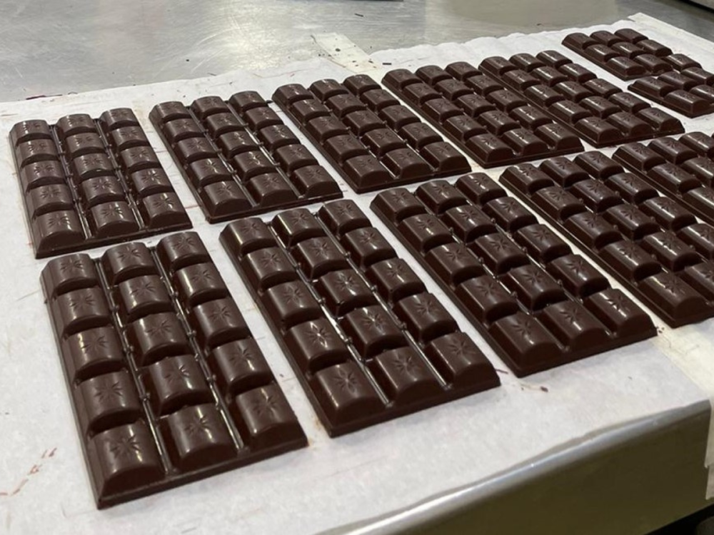 Chocolate bars laid out on a table in Penn State's chocolate facility