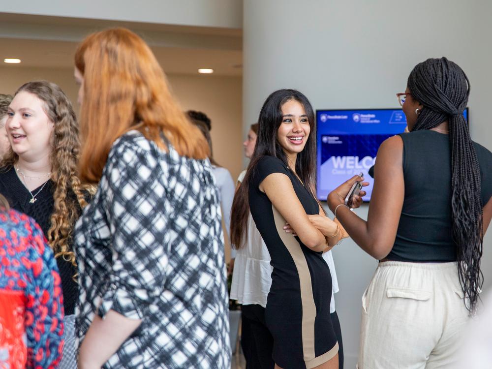 SIA students interacting during orientation on Aug. 18.