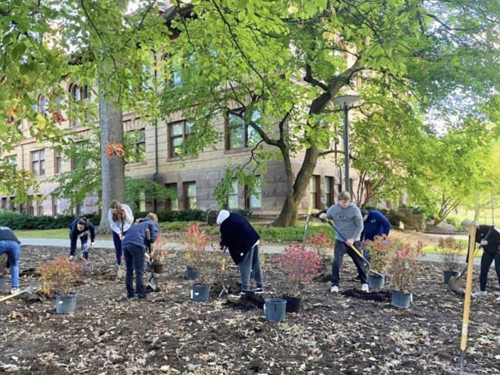 Students working on new landscape plantings at University Park campus.