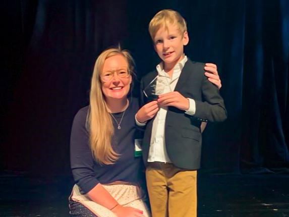 Nikki Crowley with her son after receiving Women in STEAM award