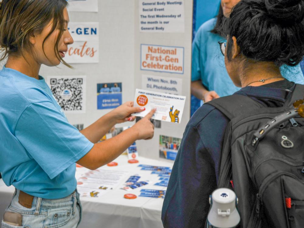 Students interacting at a 2022 tabling event