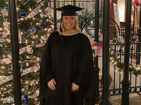 Brooke Schneider in graduation regalia