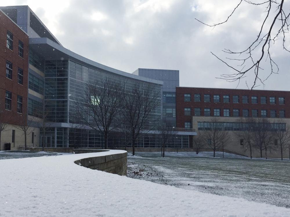 A photo of the Penn State Business Building with snow on the ground.