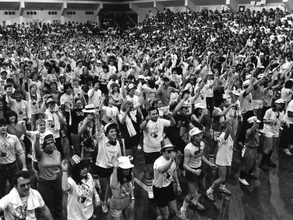 A group of students dancing at THON in 1983
