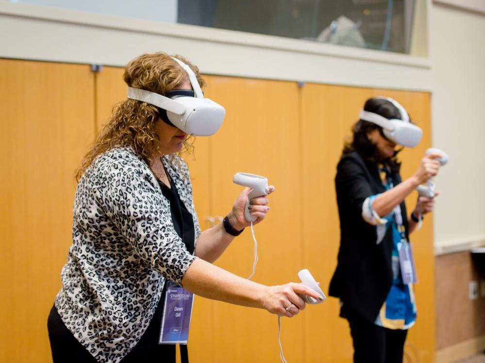 The Teaching and Learning Technologies Faculty Advisory Committee recommends topical focus areas for events including the annual TLT Symposium. The conference’s recent Explore Virtual Reality (VR) Station had attendees take their “First Steps” in VR if they had never had a virtual reality experience and an intermediate experience for those with VR familiarity.