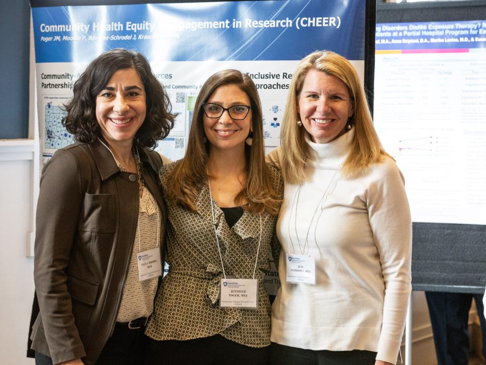 CTSI's CHEER team poses in front of research poster: L-to-R Paula Moodie, Jen Poger, Laurie Crawford