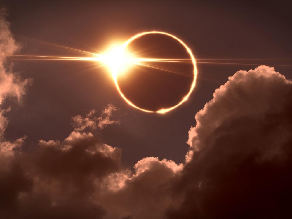 The moon covers the sun in a solar eclipse.