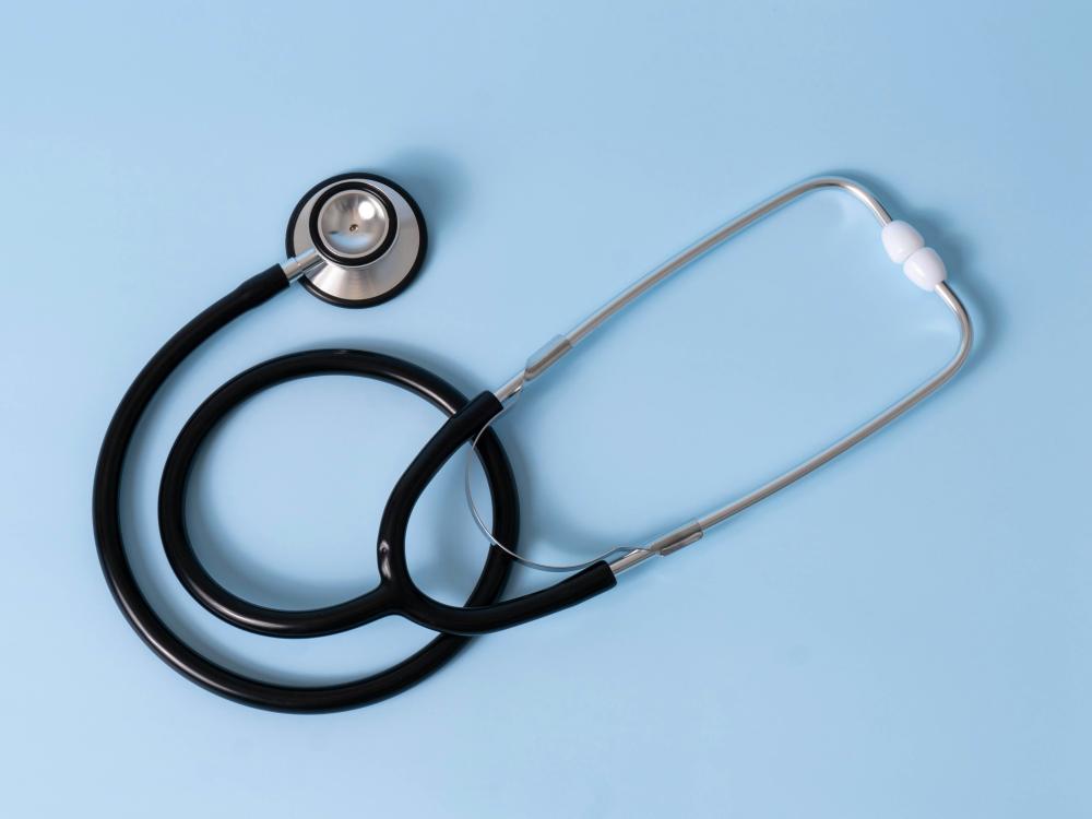 stethoscope on blue background