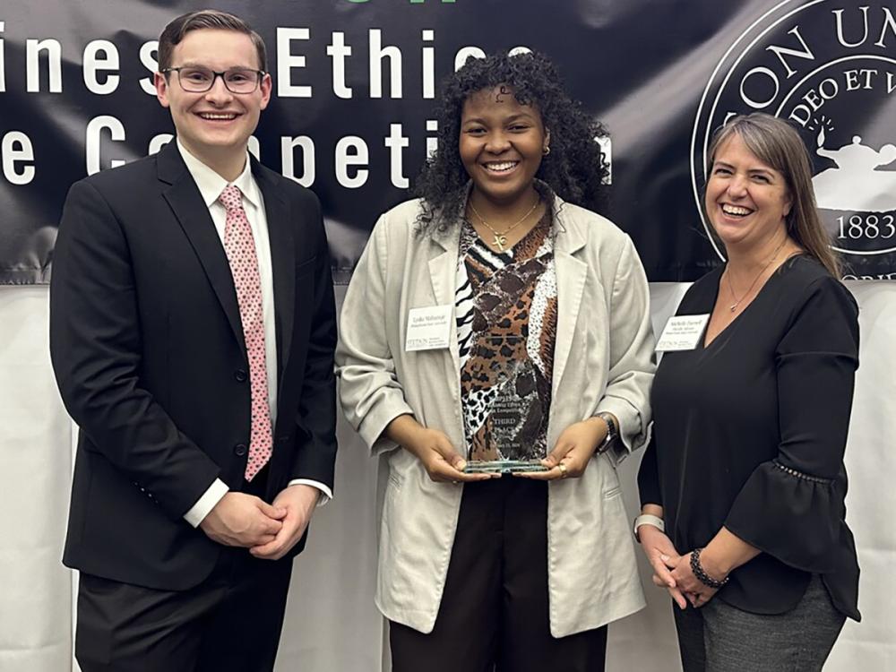 A photo of Palmer Moore, Lydia Mabamije and Michelle Darnell