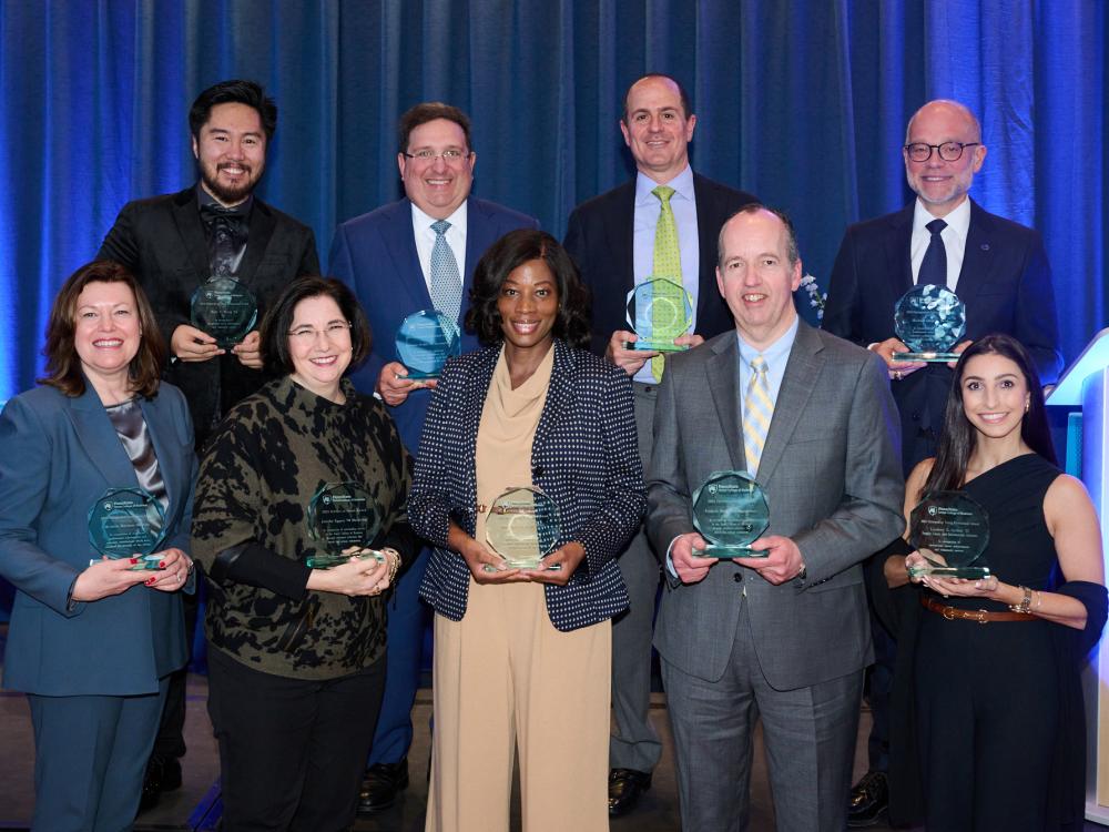 A photo of four women and five men who won Smeal Alumni Awards