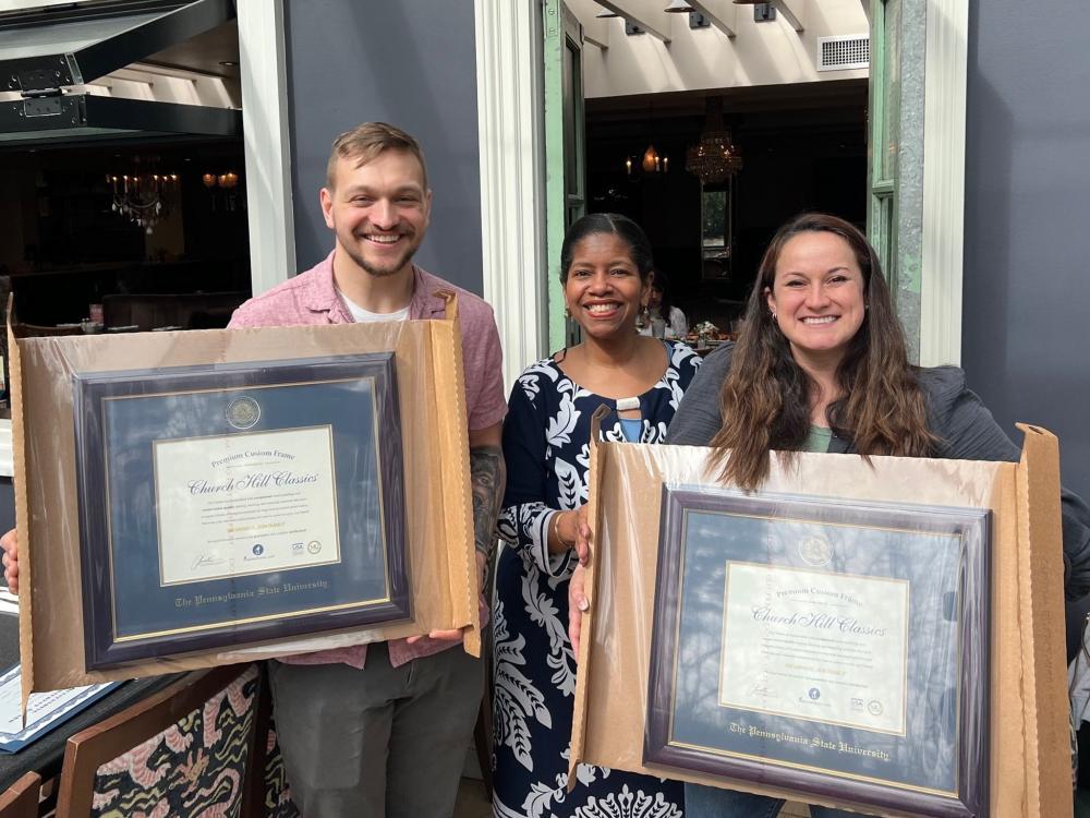 Tyler Colon and Brittany Keenan accept their Outstanding Adult Student Awards