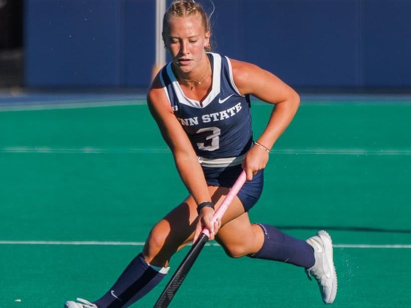 Sophia Gladieux controls the ball with her stick during a Penn State field hockey game.