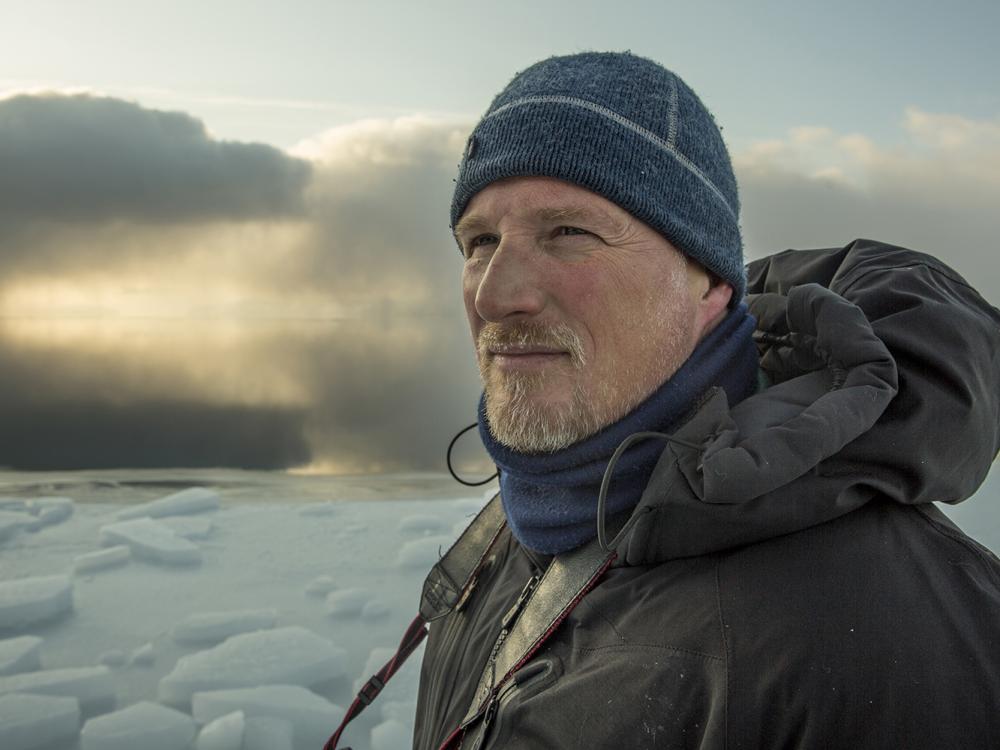 Paul Nicklen with polar background