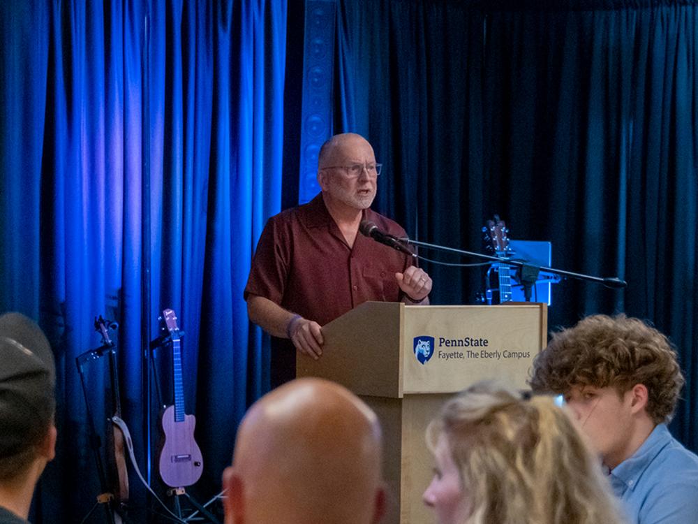 W. Charles Patrick delivering a speech after being recognized for his generosity.