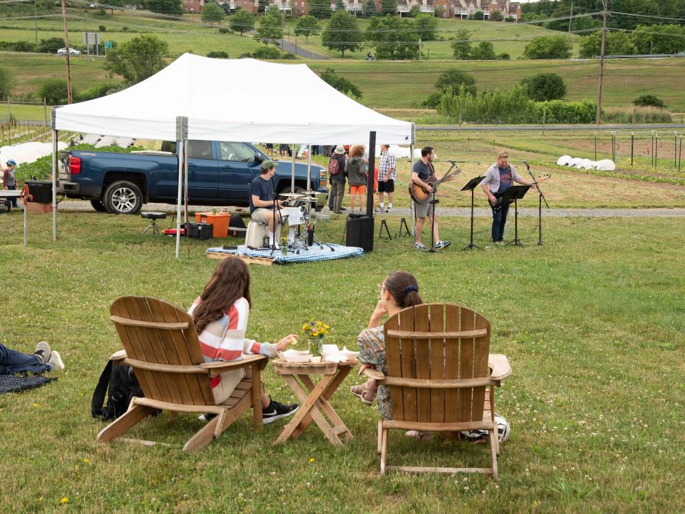 Students sitting at Student Farm event 