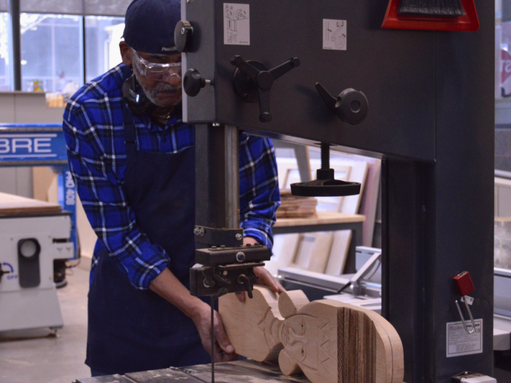 Edgar Farmer utilizes woodworking tools at OriginLabs