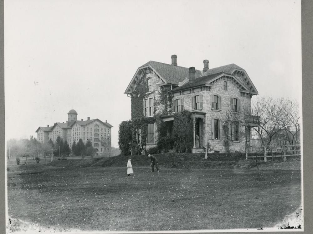 A black and white picture of a residence on a college campus in the 1890s