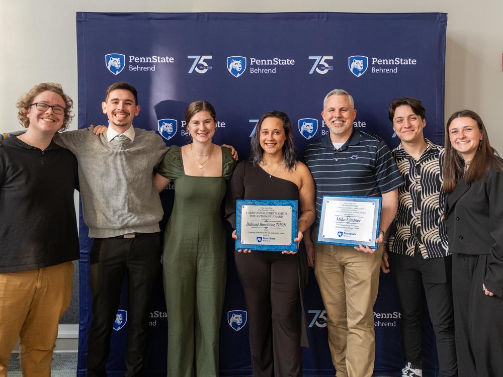 Members of Behrend Benefiting THON post with awards at the Excellence in Leadership and Service Awards at Penn State Behrend.