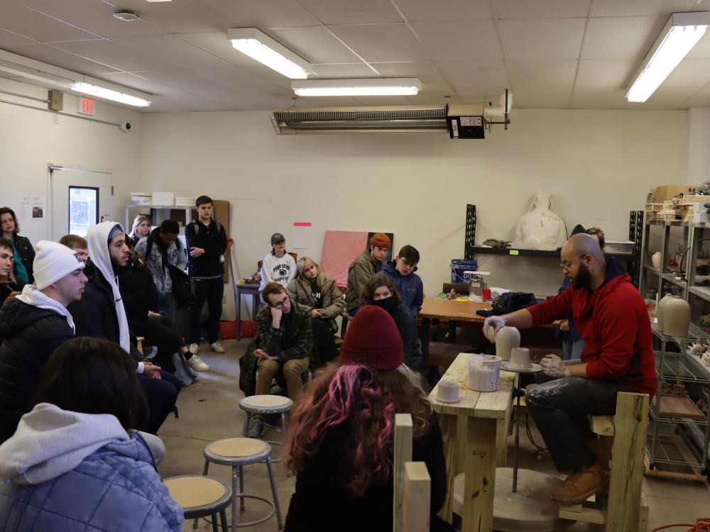 Kick-wheel demo in Annie Cross's art history class