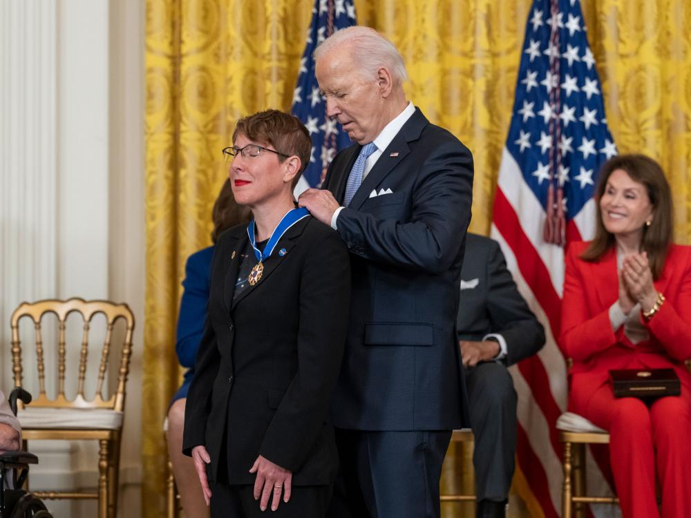 President Joe Biden presents Jane Rigby with presidential medal
