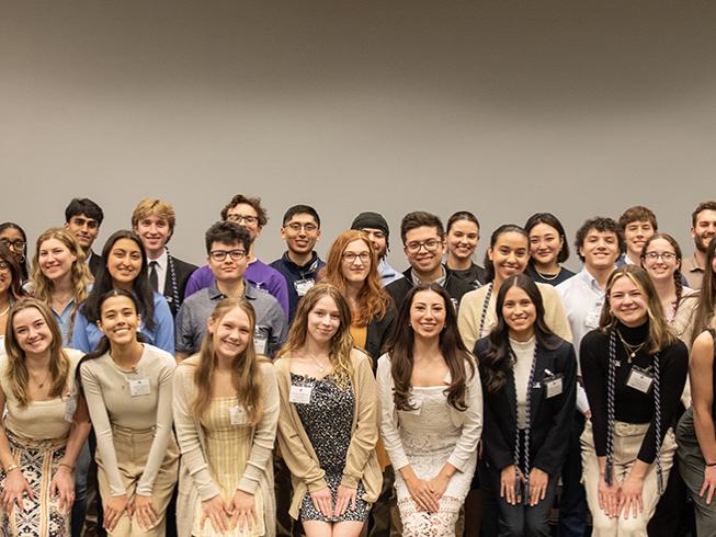Large group of Tri-Alpha Eta Psi chapter inductees