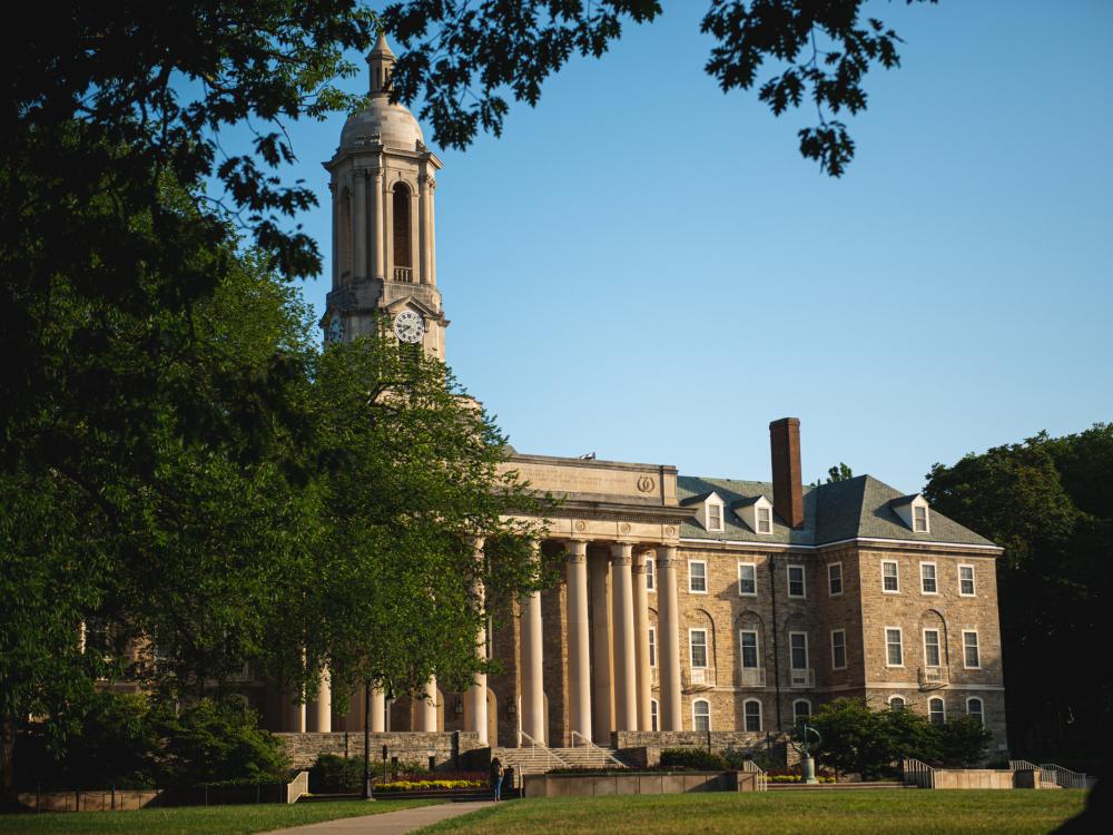 Old Main building and trees in summer