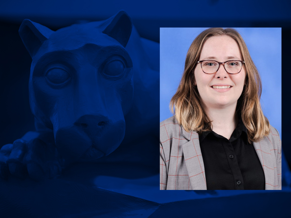 A photo of a woman smiling is overlaid on a blue background with a statue of a lion