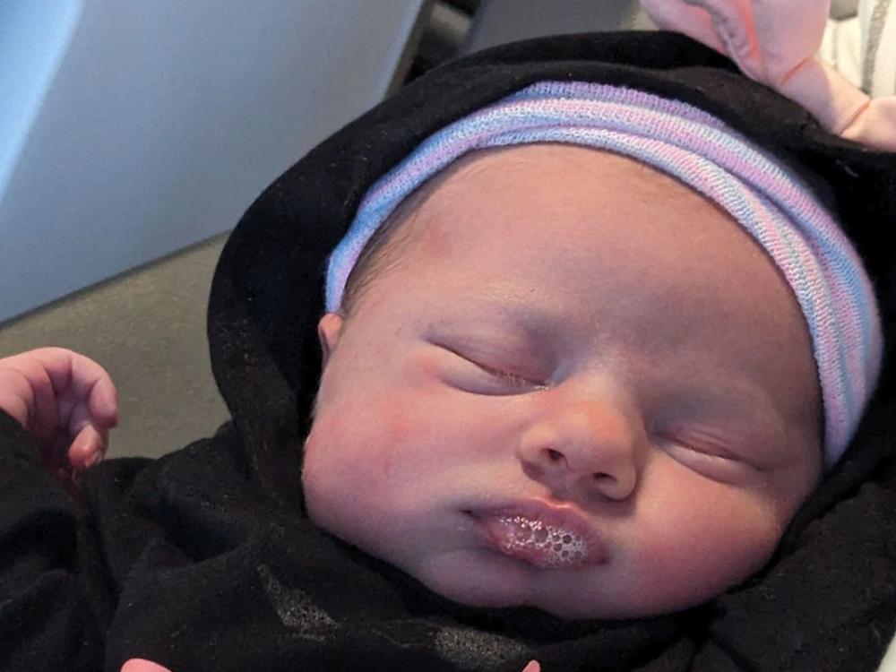 Close-up image of a newborn infant.