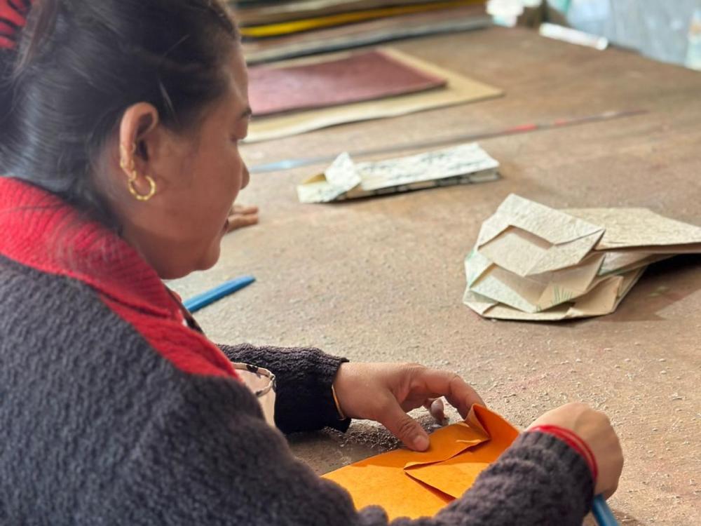 Woman making paper