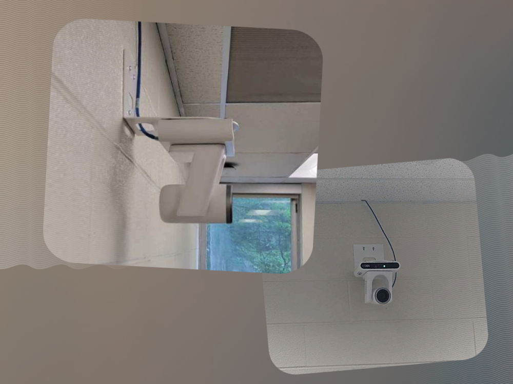 two photos showing front and side angles of wall-mounted video camera in room near ceiling