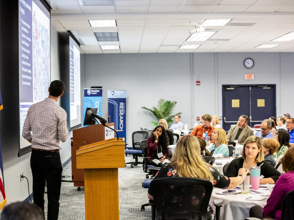 Dr. Danny George presents to the audience at CTSI's Community-Driven Research Day