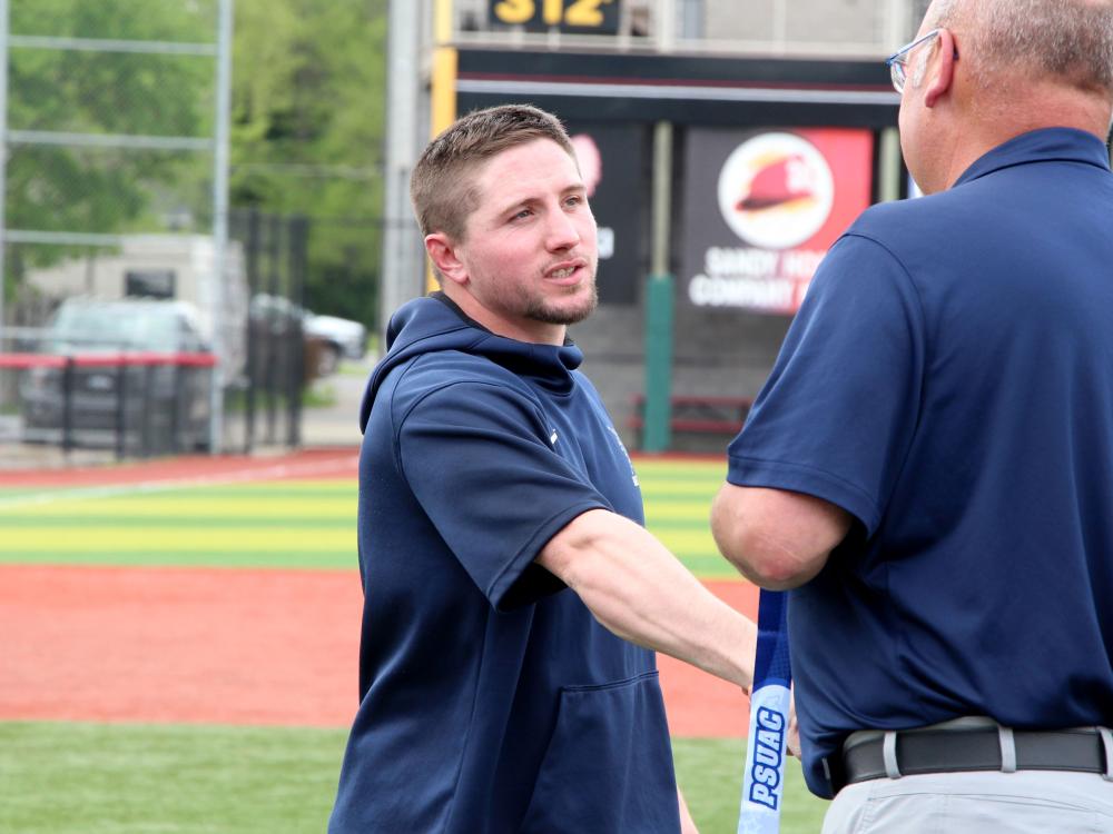 Penn State DuBois baseball coach Garrett Brown prepares to receive his PSUAC championship metal after DuBois won the conference championship in the 2023-24 season. Brown has now been named the new head coach of Penn State DuBois baseball.