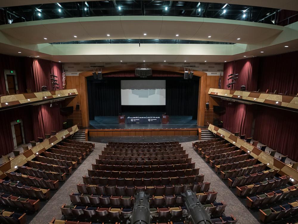 Inside of a theater, looking at stage.