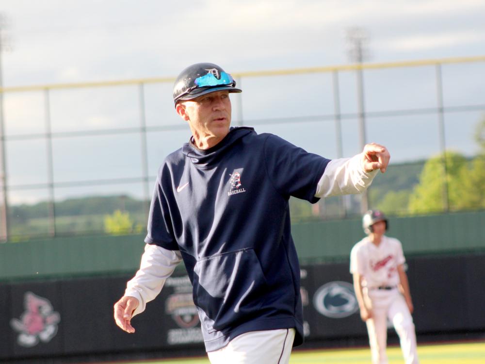 Former Penn State DuBois baseball head coach Tom Calliari gives instructions to his catcher on his way back to the dugout from a mount visit during the 2024 USCAA Small College World Series.