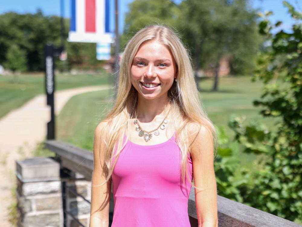 A female student standing on the Brandywine campus.