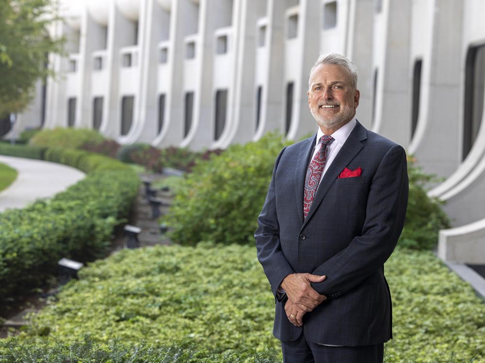 Kent Vrana poses for a portait in front of Penn State College of Medicine