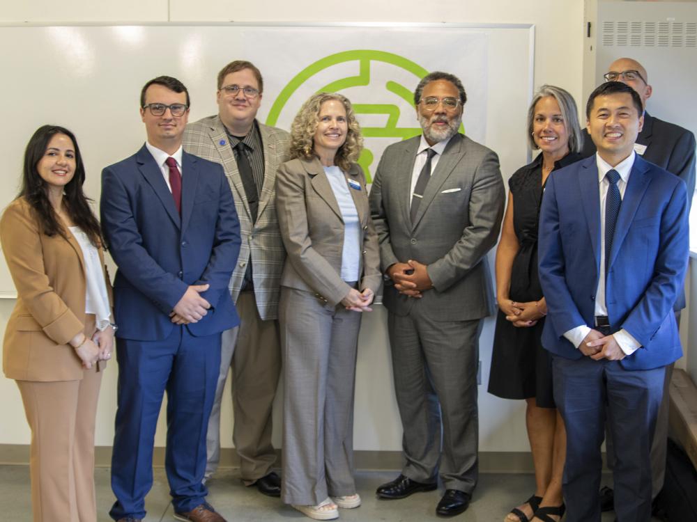 Group photo of Penn State representatives posing with the National Cyber Director Harry Coker, Jr.