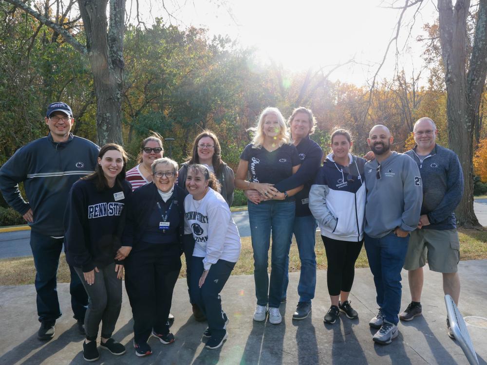 alumni posing for photo