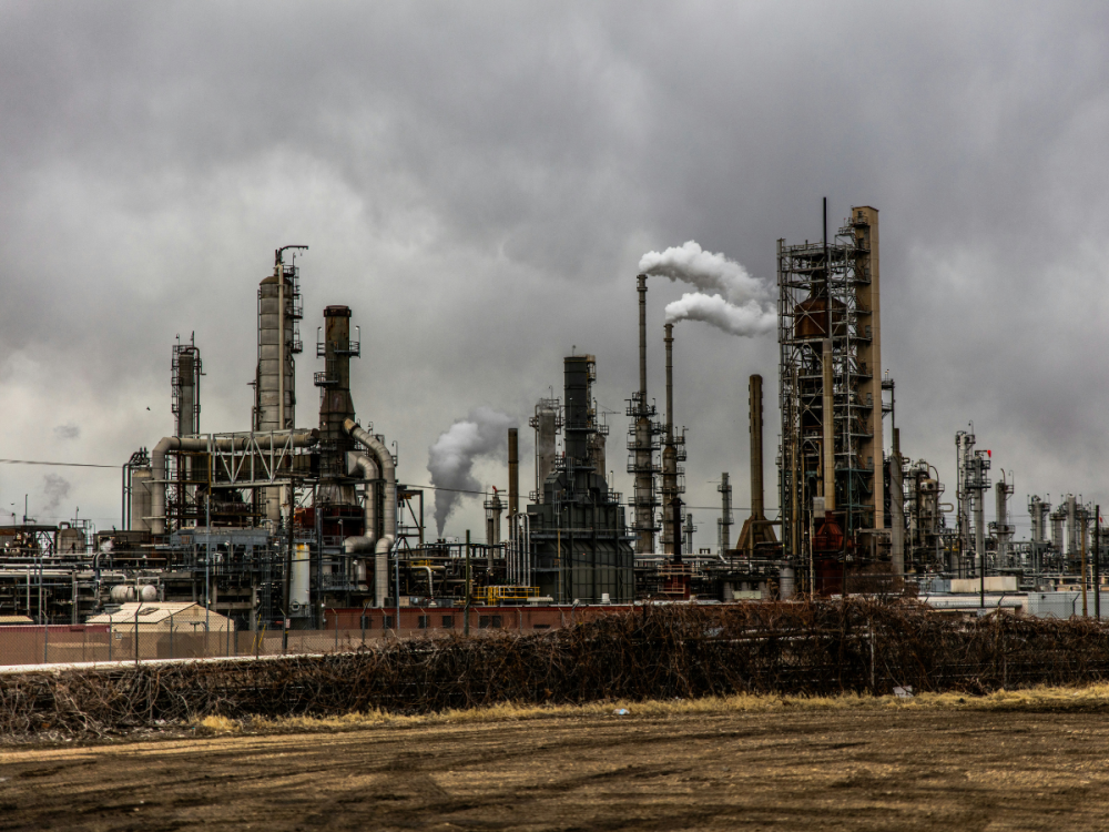 A large factory emitting smoke into the air