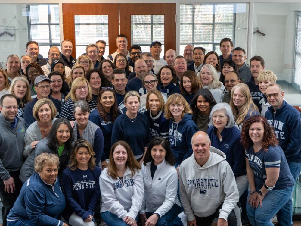 Parent volunteers with the Penn State Parents Council gather for a group photo.