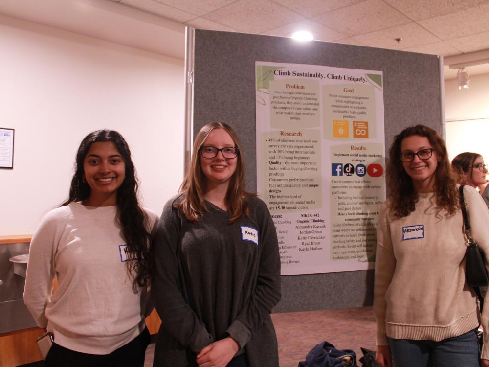 Kayla Mathew, Katie Chverchko, and Alexandra Karasik representing MKTG 442, partner: Organic Climbing