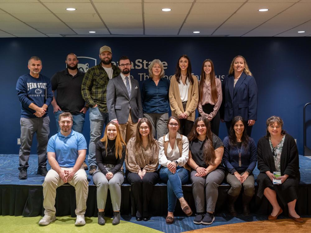 Student winners pose beside their faculty mentors at the fall Undergraduate Exhibition.