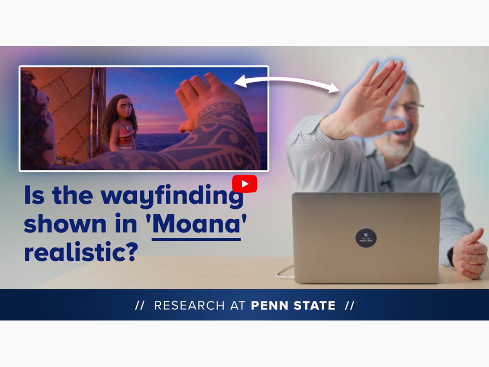 A play button overlaid on a Research at Penn State graphic showing a scene from the movie "Moana 2," an image of Penn State faculty member Christopher Palma with a raised hand, and the text "Is the way finding showing in 'Moana' realistic?"