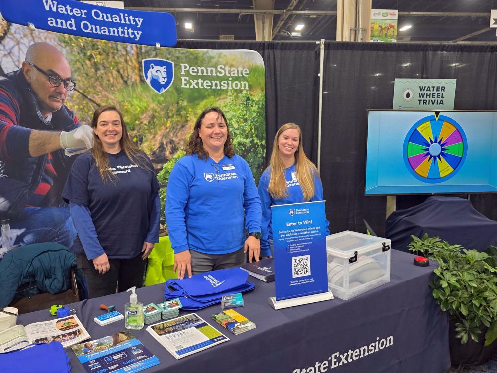 Master Watershed Steward Bethany Canner, center, at the 2025 PA Farm Show